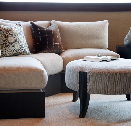Custom uppholstry bring texture to life in this sleek interior design